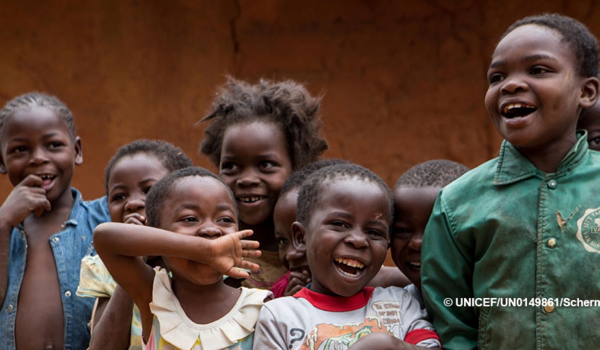 Children smile as they gather in Kasenga, Democratic Republic of Congo
